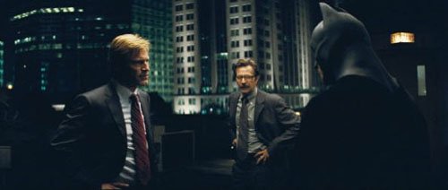D.A Harvey Dent, Lt. Gordon, and Batman chat