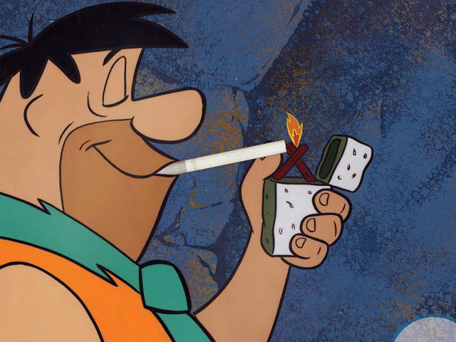 Fred Flintstone smokes a Winston cigarette in a 1960s ad